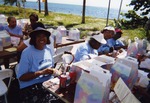 People enjoy lunch near at Virginia Key Beach