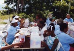 [2004] People eating lunch near ocean