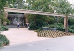 [1990] Visitors by the waterfall at the front of the Asian River Life exhibit at Miami Metrozoo
