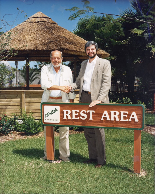 Zoo Director Bob Yokel with Arvida Corp. representative David Guy at the donated rest area at Miami Metrozoo
