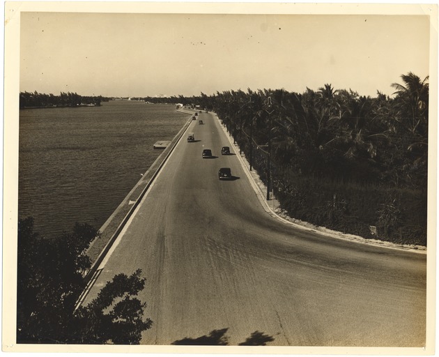 Collins Avenue at Forty-four Street - Photograph, recto: [View looking North on Collins Avenue at 44 Street, 1937]