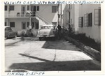 [1954-08-25] Man washing car