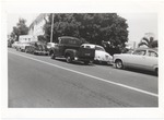 [1950/1959] Cars parked on street