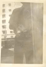 Reflection of man on window