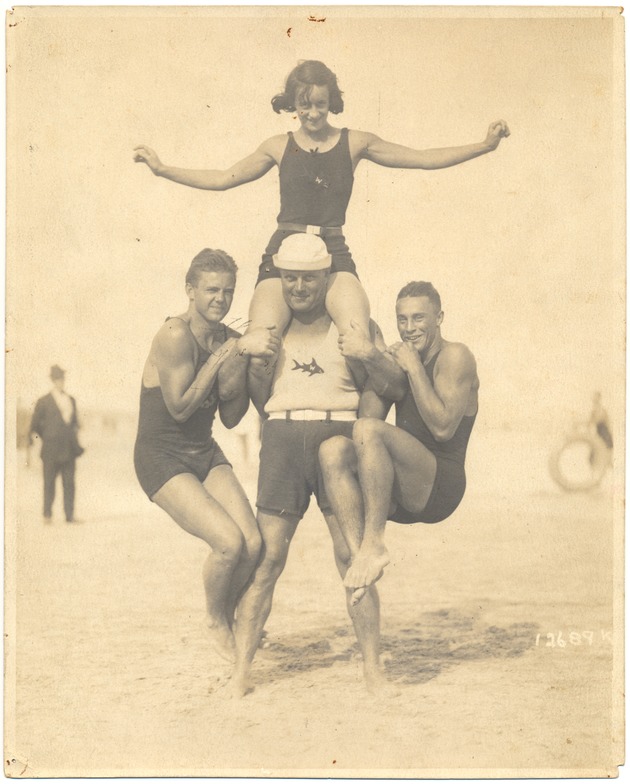 Miami Beach life guards at the Roman Pool Bath House on Ocean and Twenty-third Street - Photograph, recto: [Miami Beach Officials and Employees: Jack Button and Mrs. Lindsey, swimming instructors outside the Roman Pools Bath House on Ocean and 23rd Street] 