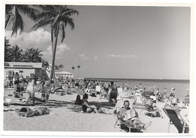 Beach goers and structures on Miami Beach