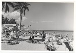 Beach goers and structures on Miami Beach