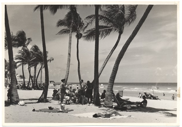 Beach goers in the shade on Miami Beach