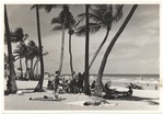 Beach goers in the shade on Miami Beach