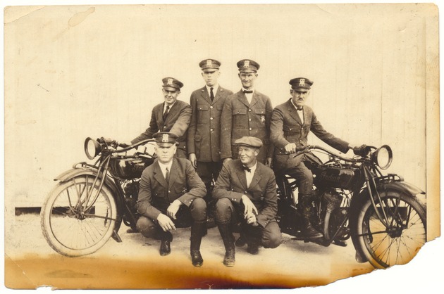 Miami Beach Police officers and two motorcycles