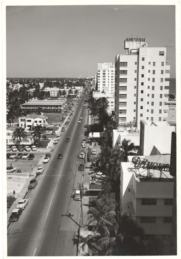 Miami Beach street scenes in the 1950s - Photograph, recto: [View of Martinique Hotel (demolished) and the Monte Carlo Hotel looking north from 65th Street and Collins Ave]
