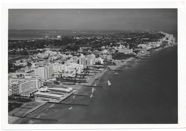 Looking north from the ocean, showing the DiLido, Roney Plaza, Seville, and Fontainebleau Hotels - 