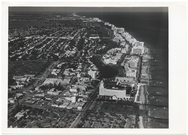 Looking north from over Collins Park, showing the Bass Museum, teh Roney Plaza, Hebrew School (under construction), Forty-first Street, and the Fontainebleau - 