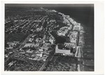 Looking north from over Collins Park, showing the Bass Museum, teh Roney Plaza, Hebrew School (under construction), Forty-first Street, and the Fontainebleau