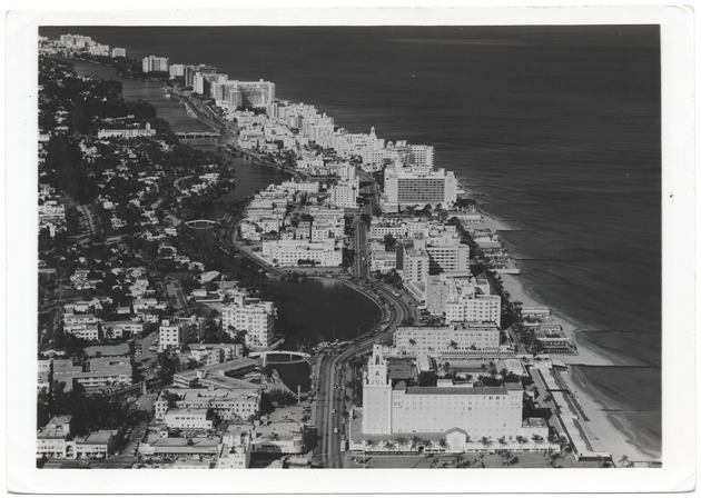 Looking north from the Roney Plaza, showing oceanfront hotels up to the Fontainebleau, with North Beach in the distance - 