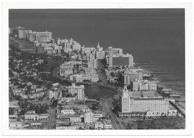 Looking north from Twenty-third Street showing oceanfront hotels including the Palm Court, Roney Plaza, Seville, Fontainbleau, Eden Roc, and Doral - 
