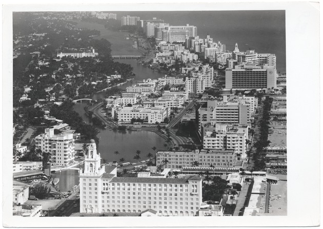 Looking north from the Roney Plaza, showing the Helen Mar, Algiers, Seville, and Fontainebleau Hotels, as well as Lake Pancoast and Indian Creek - 