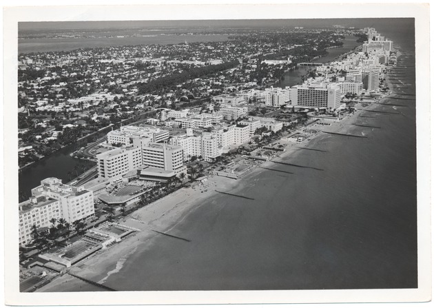 Looking northwest from over the ocean, showing the Atlantis, Algiers, Bel Mar, Seville, Saxony, and Fontainebleau Hotel - 