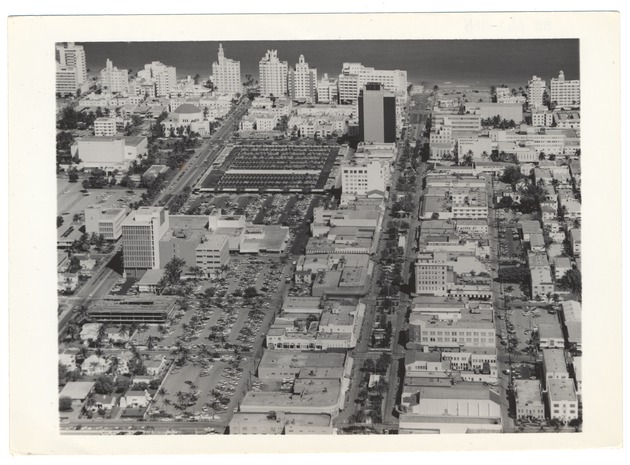 Miami Beach looking east over Lincoln Road Mall from Michigan Avenue. The Colony Theater, the Miami Beach Federal Bank and the DiLido Hotel on the left. The Sands and New Yorker hotels on the upper right - 