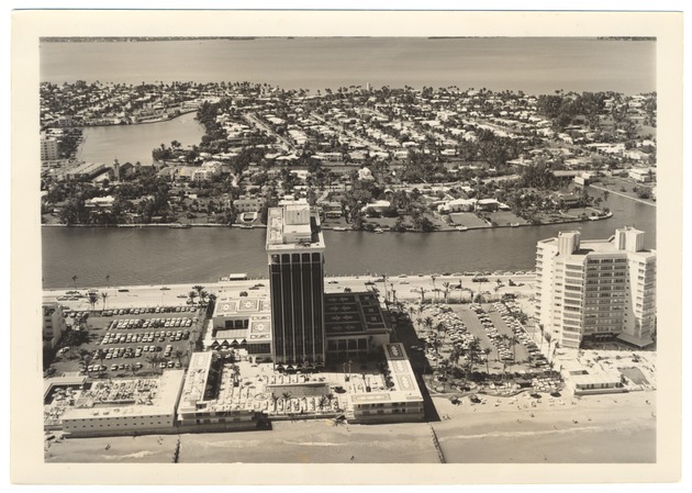Looking west over the Doral Hotel. The Executive House in the right and Lake Surprise and Biscayne Bay in the back - 