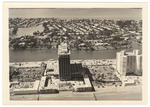 Looking west over the Doral Hotel. The Executive House in the right and Lake Surprise and Biscayne Bay in the back