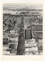 Collins Avenue showing Lincoln Road Mall, the DiLido Hotel, the Miami Beach Federal Bank, and the Venetian Causeway in the back