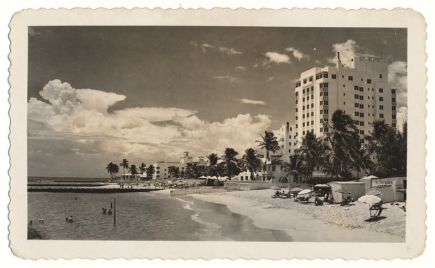 Ocean side view of Miami Beach and scenes surroundings the White D. Garage - Photograph, recto: [Miami Beach with the St. Mortiz Hotel on the right, seen from the ocean side, May 1947]