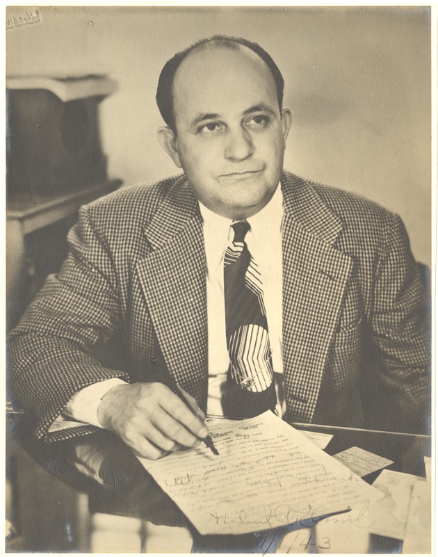 Miami Beach Mayor Herbert A. Frink working in office