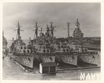 Four ships of Destroyer Division 22 docked in harbor, 1956