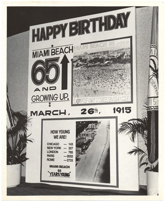 Miami Beach 65th Anniversary, 1980 - Photograph, recto: [Sign reading, "Happy Birthday Miami Beach... 65 and Growing Up."]