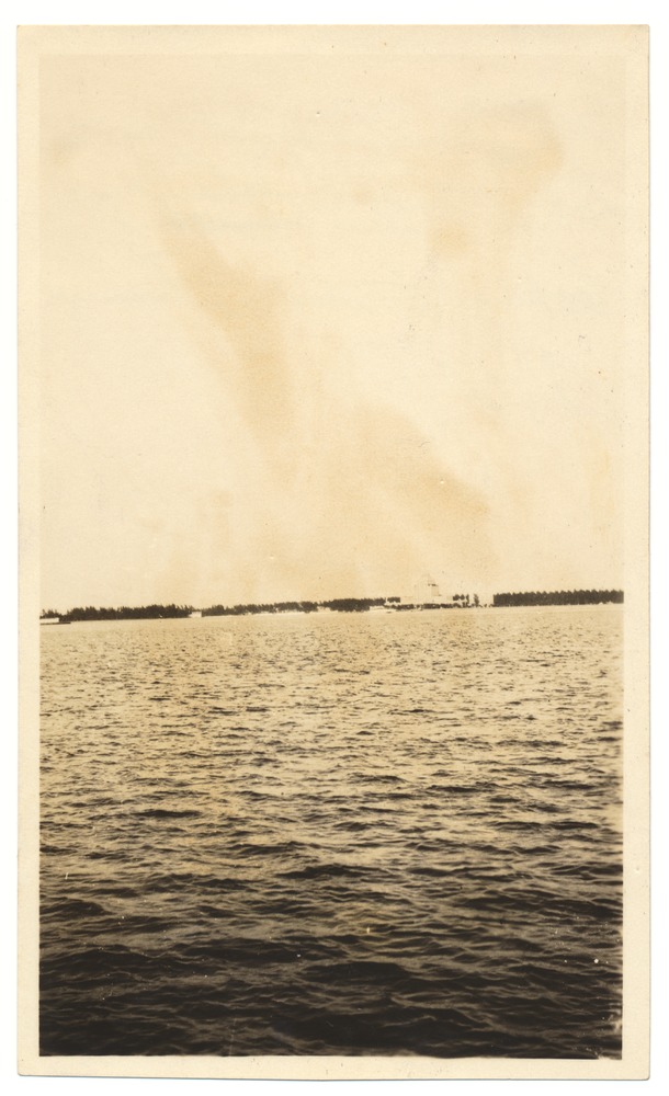 Flamingo Hotel, Miami Beach, and Star Island from Palm Island - Photograph, recto: [Flamingo Hotel and Miami Beach, seen from August Geiger lot on Palm Island].