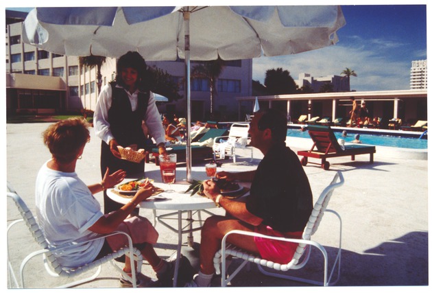 Diners by the Flamingo Hotel pool - 