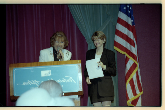 Women at podium