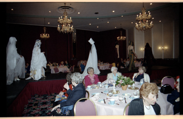 Guests watching fashion show