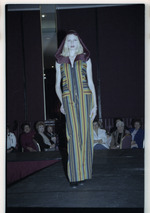 Model poses in outfit