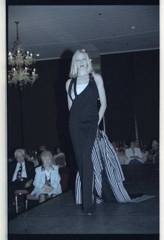 Model walking on runway
