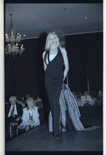 Model walking on runway