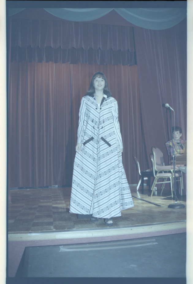 Model poses on stage