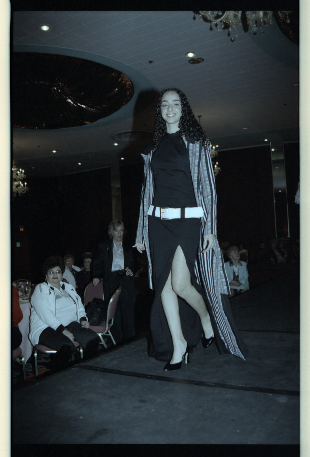 Model walking on runway