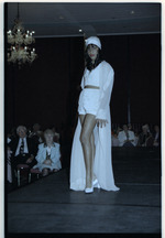 Model standing on runway