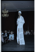 Model standing on runway