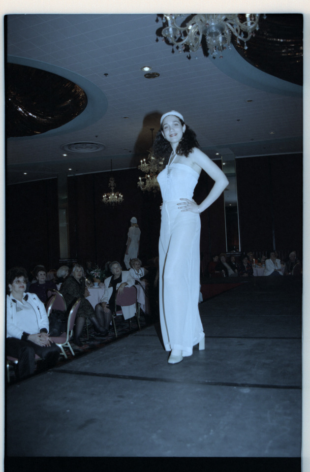 Model standing on runway - Recto Photograph