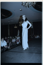 Model standing on runway