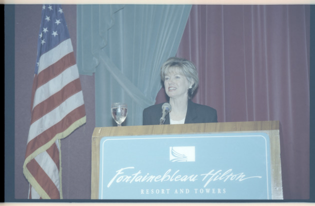 Woman at podium