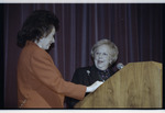 Two women at podium