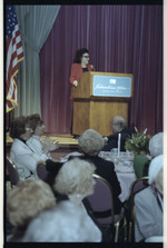 Woman at podium