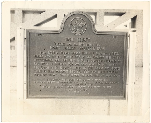 Dade County plaque for Francis L. Dade - Photograph, recto: [Plaque, inscription reads "Dade County created January 28, 1836, named for Major Francis Langhorne Dade." It stands in front of the Miami-Dade County Court House at 73 W. Flagler Street].