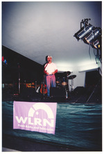 Lincoln Road concert at night. WLRN radio banner in foreground