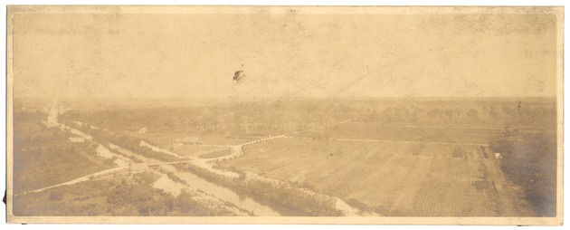 Miami Beach ocean and waterway scenes - Photograph, recto: ["Cross State drainage canal and roadway in the Everglades, west of Miami"].