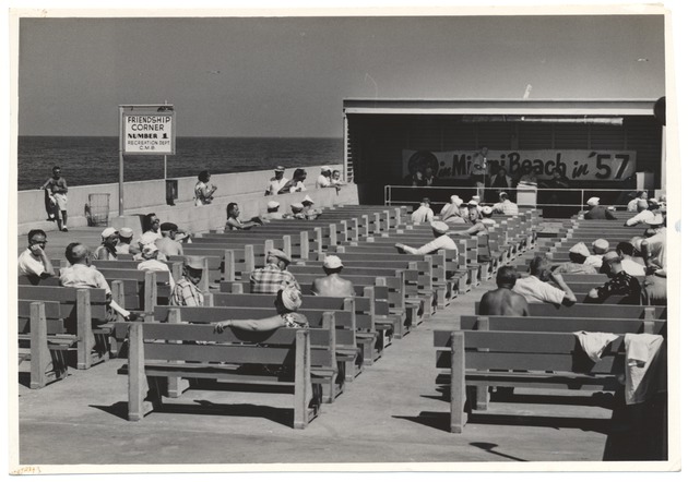 People Sitting on Benches at the Friendship Corner